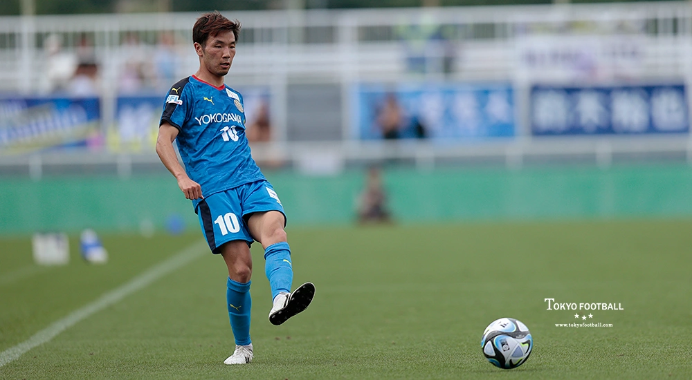 写真:ゲームをコントロールする10番後藤。