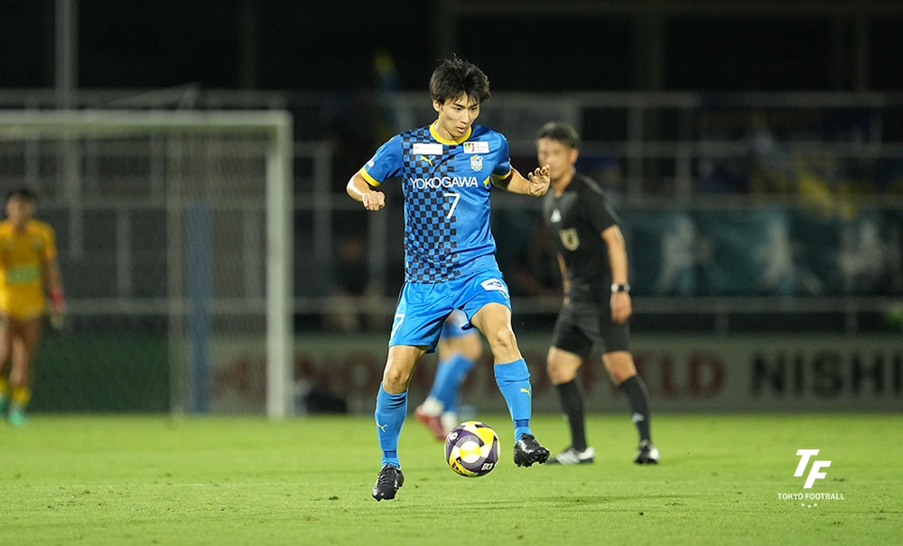 写真:JFL通算100試合出場を達成したMF金田。