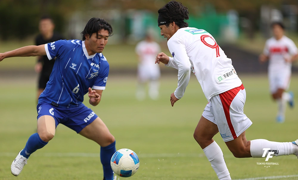 写真：ドリブル突破を仕掛ける東京23の神田。